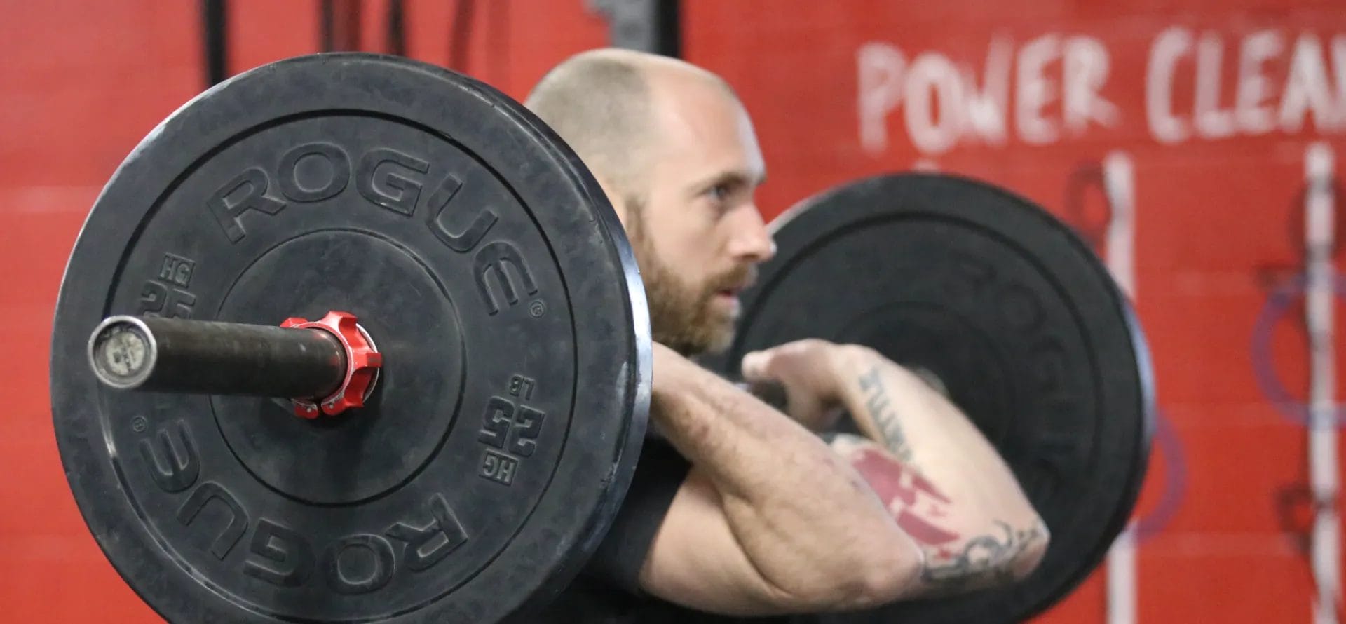 Man lifting weights at CrossFit Danbury